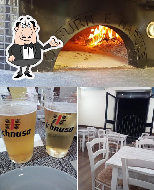 La immagine di interni e birra da Pizzeria O Vesuvio