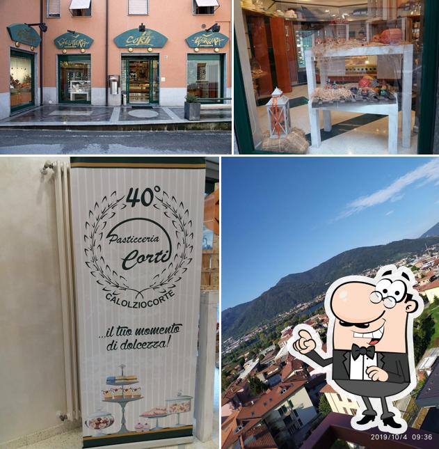 Questa è la immagine che presenta la esterno e cibo di Pasticceria Corti