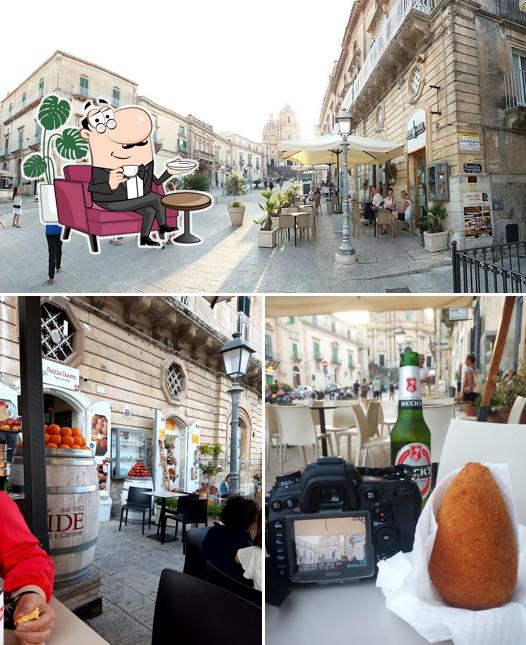 La foto di interni e esterno da Piazza Duomo food & beverage