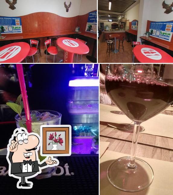 Nuova Pizzeria Marconi si caratterizza per la interni e bevanda