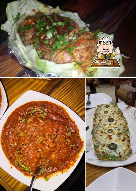 Try out pizza at royal spice restaurants & bar