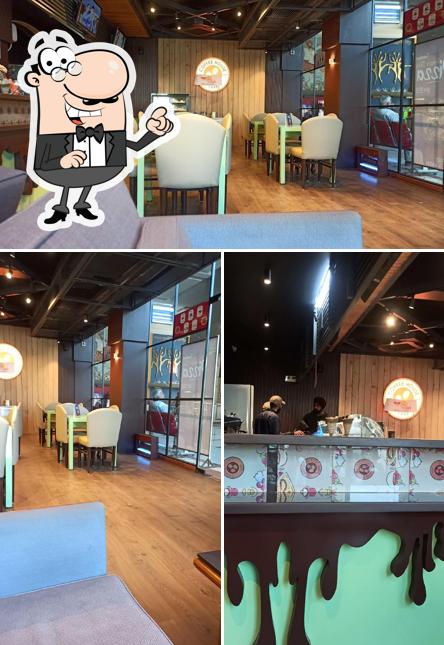 Take a seat at one of the tables at Coffee House