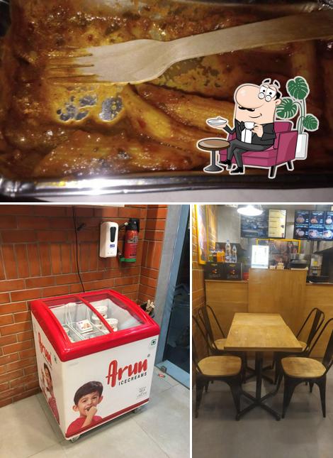 Take a seat at one of the tables at Oyalo pizza Srirangam