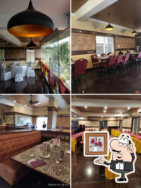 Take a seat at one of the tables at Falcon Restaurant