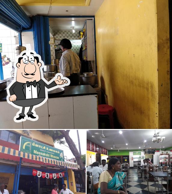 Take a seat at one of the tables at Meenakshi Bhavan- Pure vegetarian restaurant
