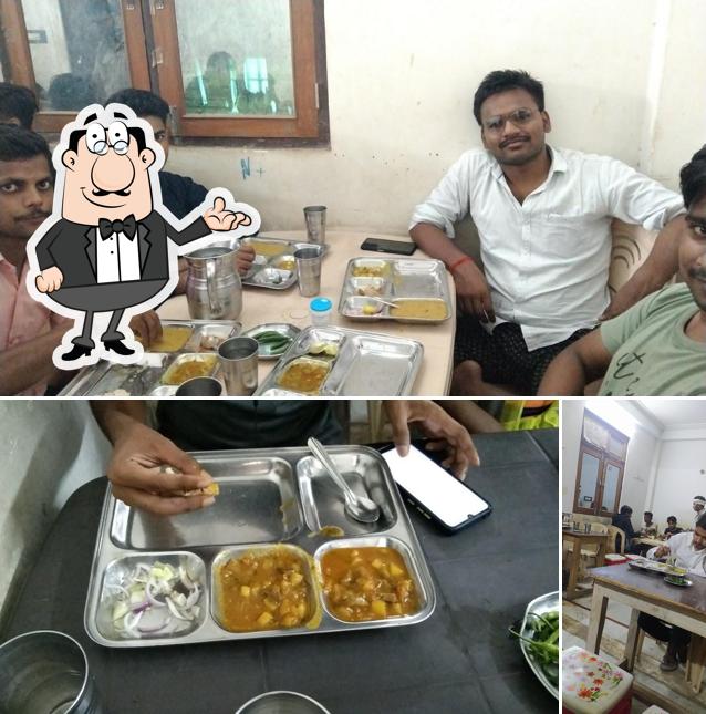 This is the picture displaying interior and food at Shiv Bhojnalaya