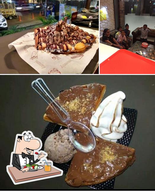 Check out the picture depicting food and interior at Spice n 'Ice
