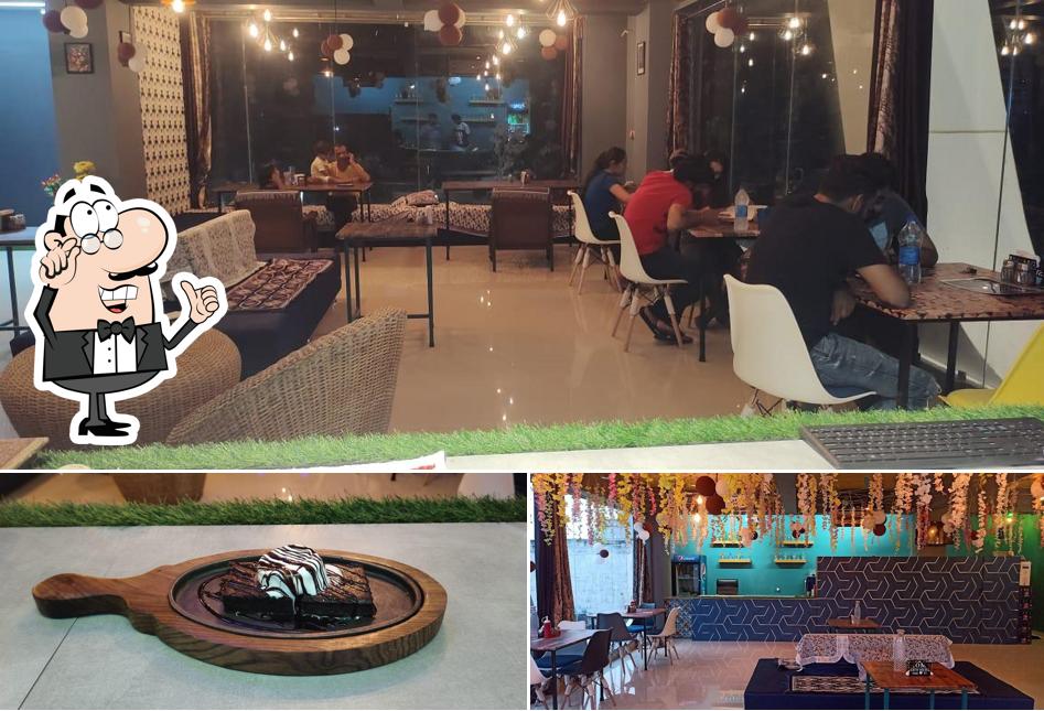 Check out the photo displaying interior and food at Vibes Cafe