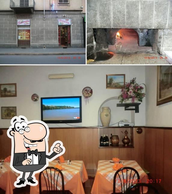Siediti a un tavolo di Pizzeria Venusia