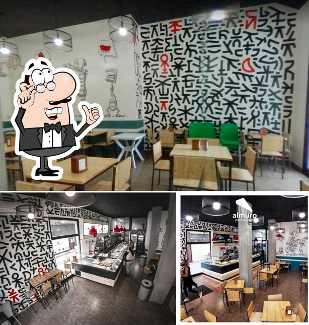 Dai un'occhiata agli interni di Al muro Pizza Al Taglio