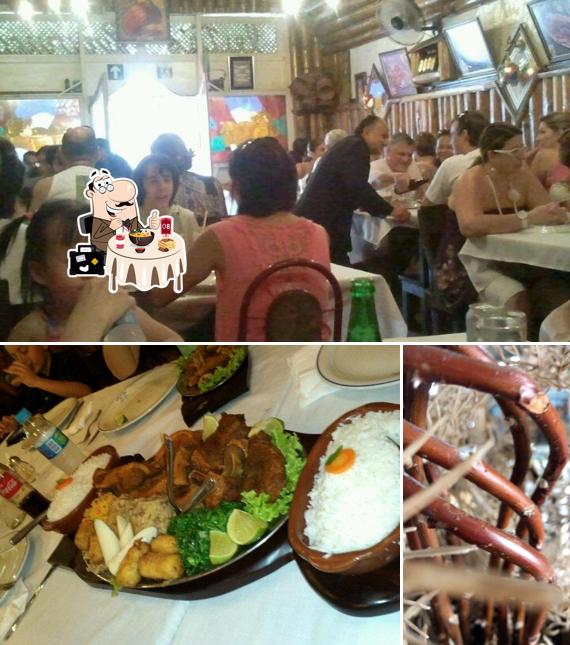Dê uma olhada a foto mostrando comida e interior no Cabana de embu