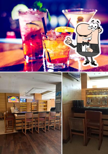 This is the picture depicting interior and beverage at The Bar & Lounge