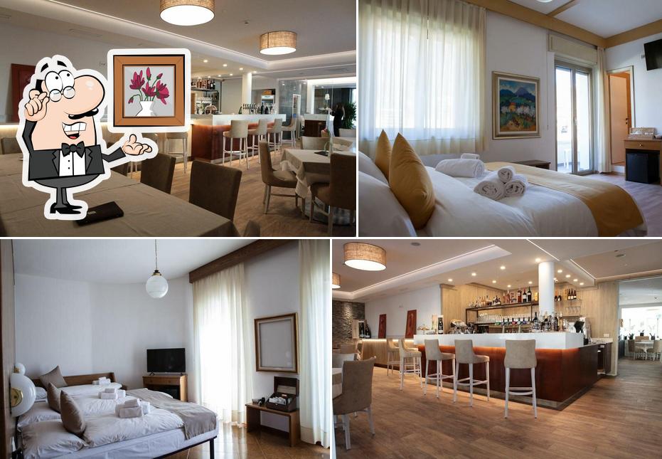 Dai un'occhiata agli interni di Athos Hotel