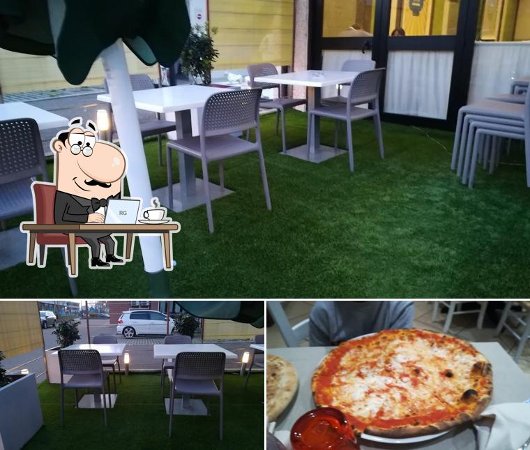 Dai un’occhiata alla foto che mostra la interni e pizza di Circus del Negresco
