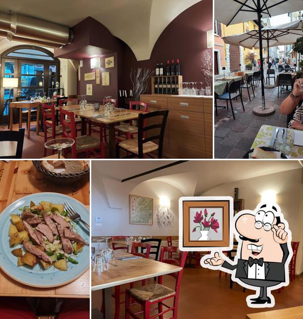 Siediti a un tavolo di La Taverna del garda