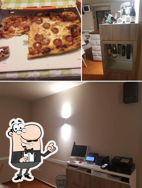 La foto della interni e pizza di Pizzeria Amadeus