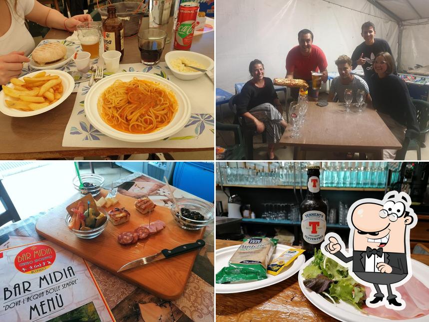 Gli interni di Bar Midia e Centro sportivo