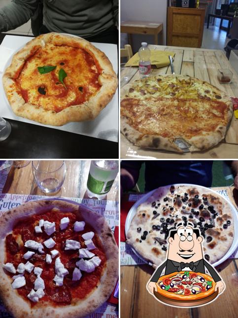 A Pizzeria O'Scugnizzo e Piccola Cucina, puoi provare una bella pizza