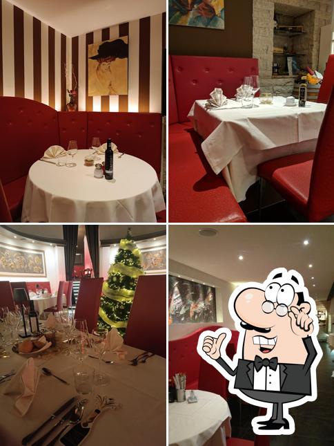 Siediti a un tavolo di Ristorante Pizzeria Tema