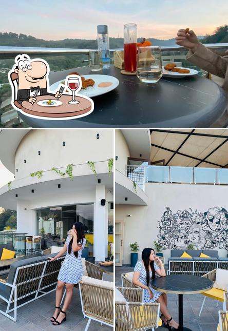This is the image displaying food and interior at Daddy Rooftop Restaurant
