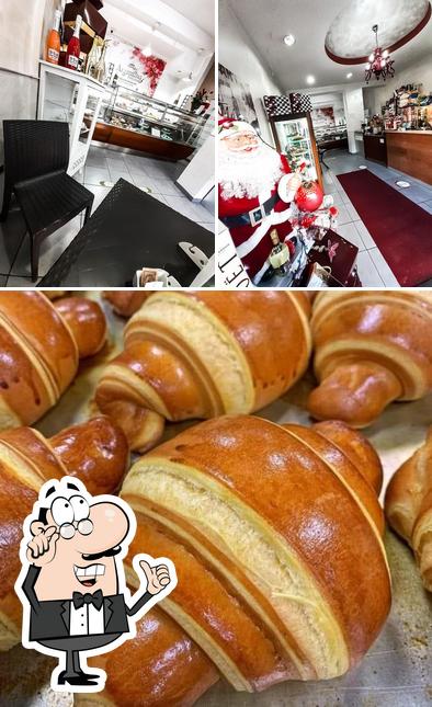 Guarda la immagine che raffigura la interni e cibo di Pasticceria Rosticceria Divinità Afragola