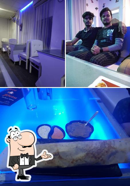 This is the photo showing interior and beverage at Delhi roll’s cafe/restaurant & personal place