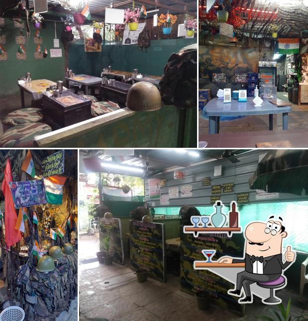 Take a seat at one of the tables at Hotel Jay Jawan mutton bhakri