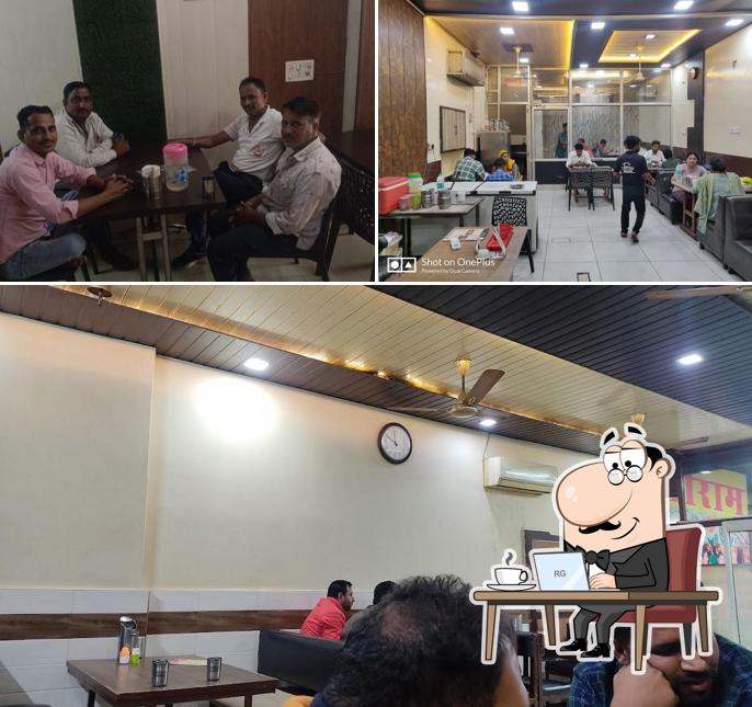 Take a seat at one of the tables at JANTA DHABA