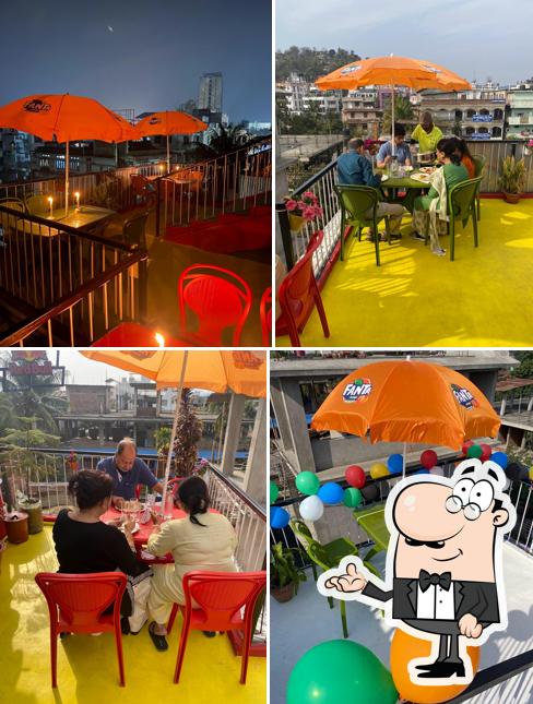 Take a seat at one of the tables at Tridhara Food Court