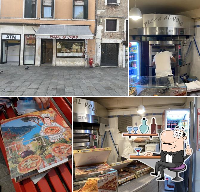 Dai un'occhiata agli interni di Pizza al Volo