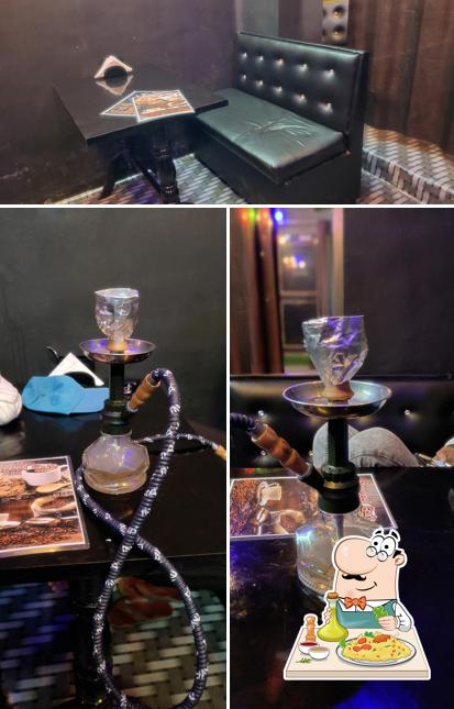 Among various things one can find food and interior at Charcoal Cafe Sabji Mandi