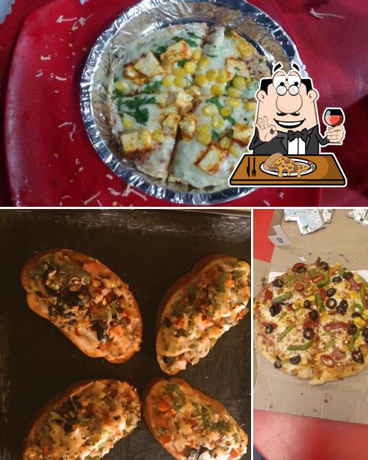 Try out pizza at Shyamal Food Court