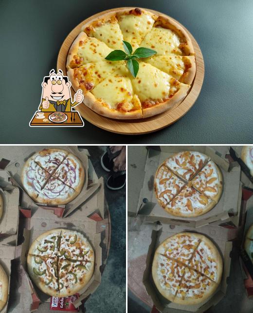 Try out pizza at THE PIZZA HOUSE
