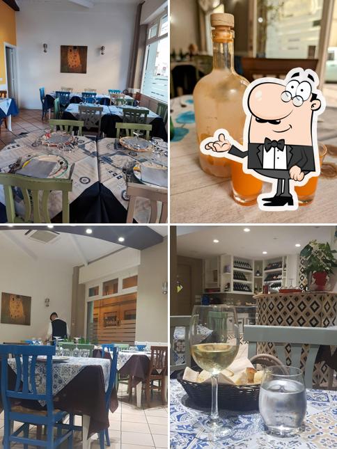 Siediti a un tavolo di Calamarè Ristorante Pizzeria