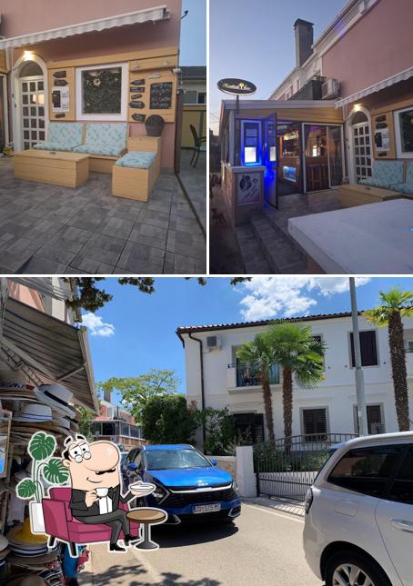 Dai un’occhiata alla foto che presenta la interni e esterno di Maita'i bar Malinska