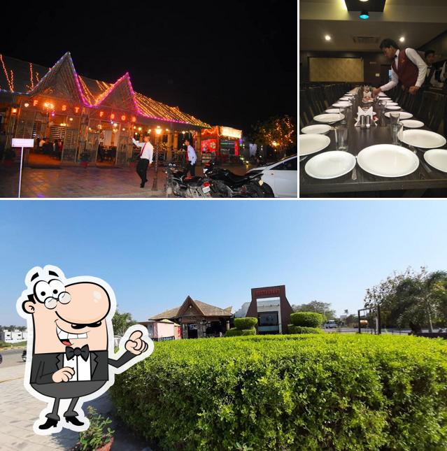 Among various things one can find exterior and dining table at Hotel Namaste
