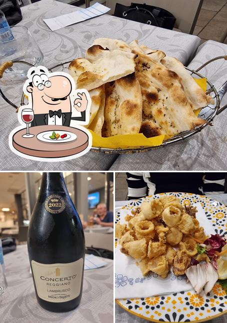 Questa è la foto che presenta la cibo e interni di Pizzeria Orchidea Bistrot