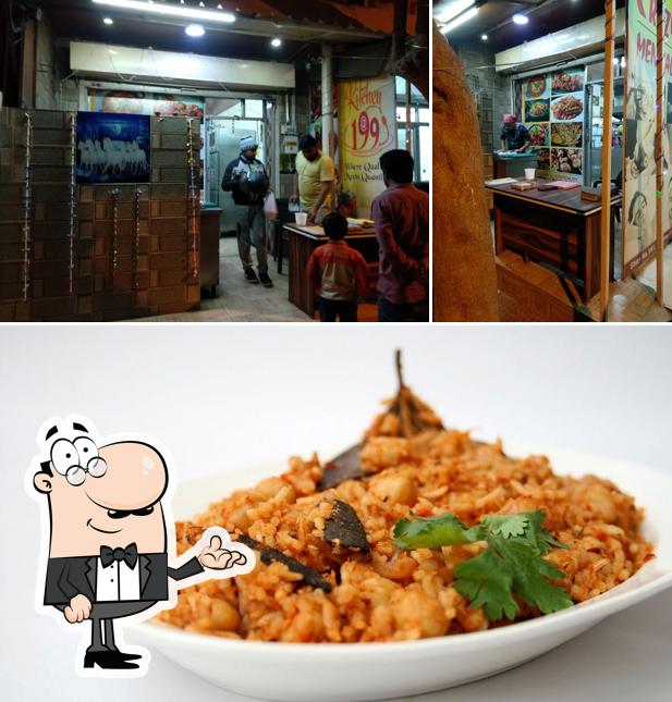 Check out the image depicting interior and food at The New Koyla Kitchen