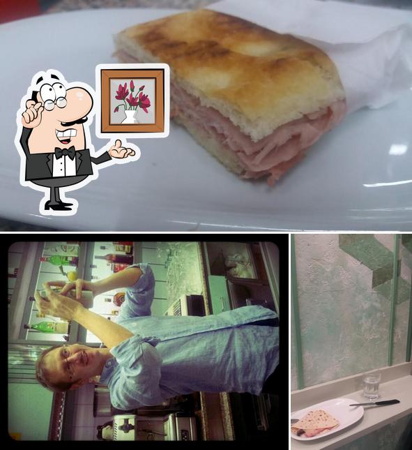 Questa è la foto che presenta la interni e cibo di Il Baretto