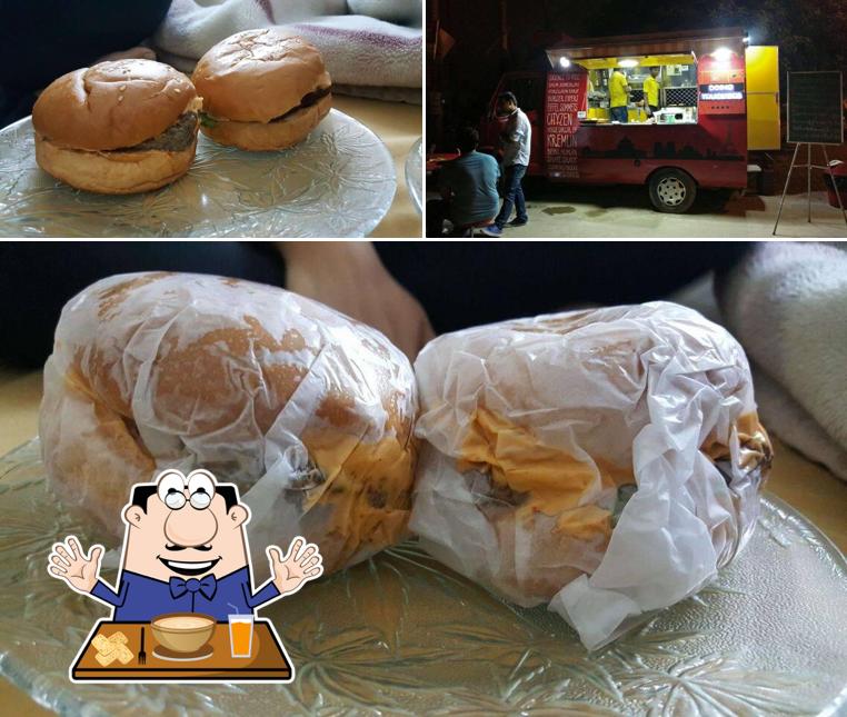 The photo of food and blackboard at Being Truckers