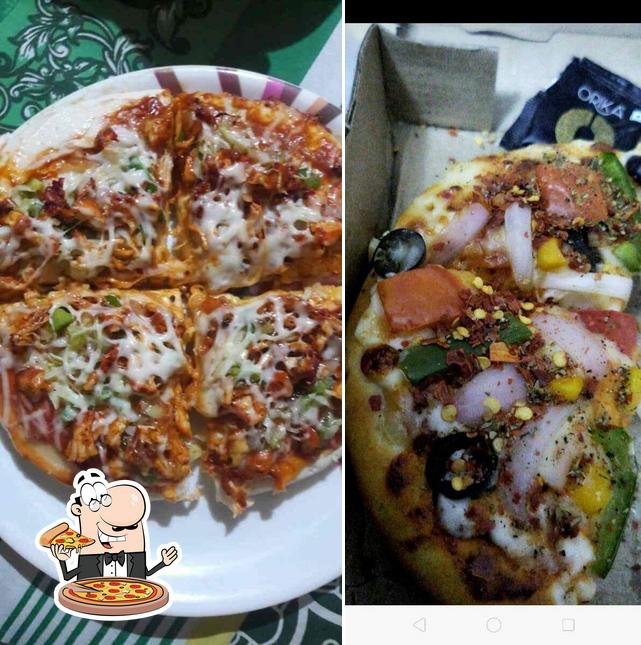 Order pizza at Kwality King