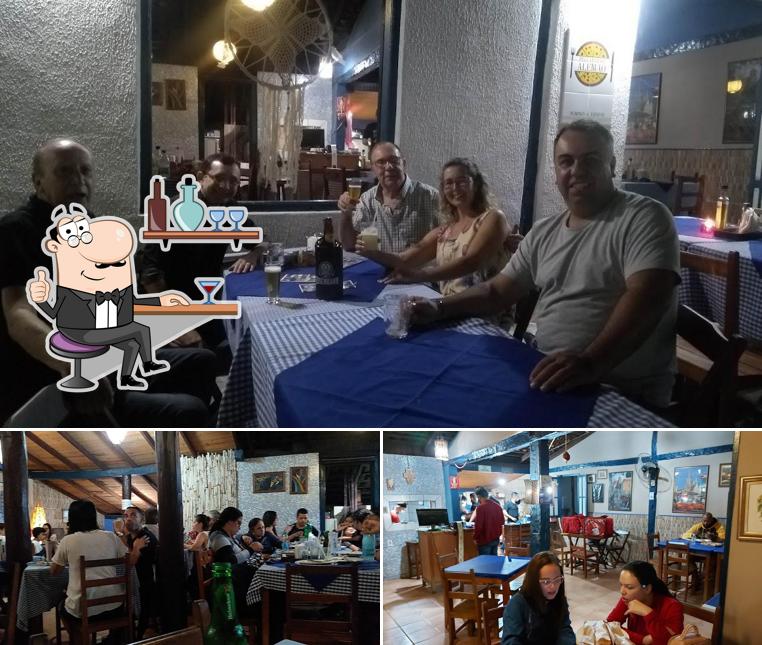 Veja imagens do interior do Pizzaria Do Alemão