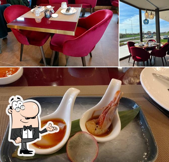 Guarda la immagine che mostra la interni e cibo di Fuji Restaurant
