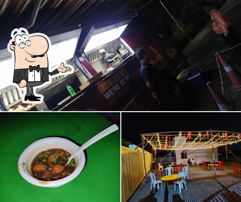 This is the image displaying interior and food at Belly's Kitchen By keshwara's