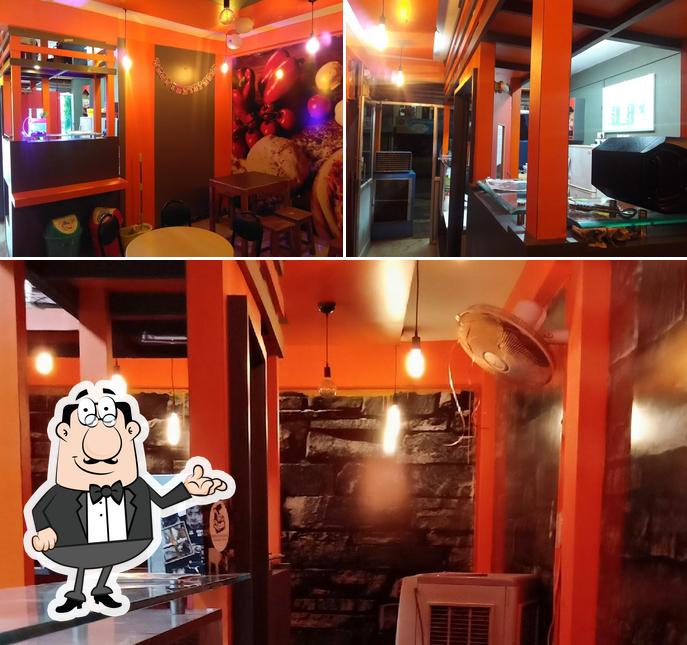 The interior of CHINGARI'S pizza
