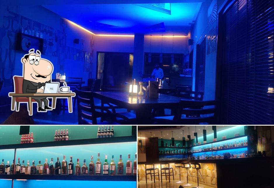 Take a seat at one of the tables at Risa Bar & Cafe