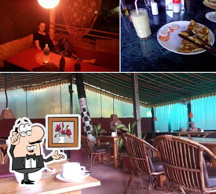 Check out the photo depicting interior and beverage at Totem Restaurant