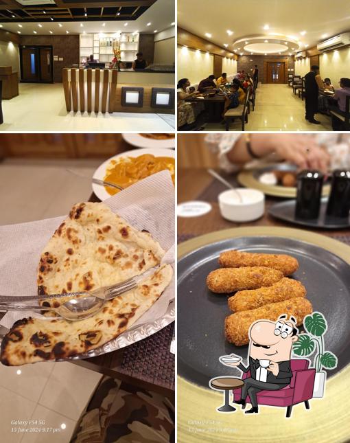 Take a look at the photo depicting interior and food at Lhasa