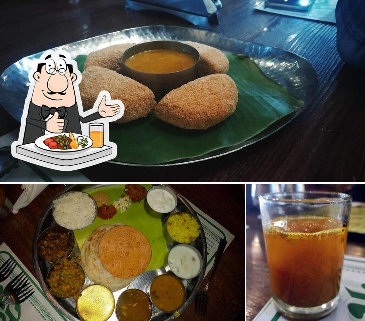 The photo of food and beer at Naivedyam
