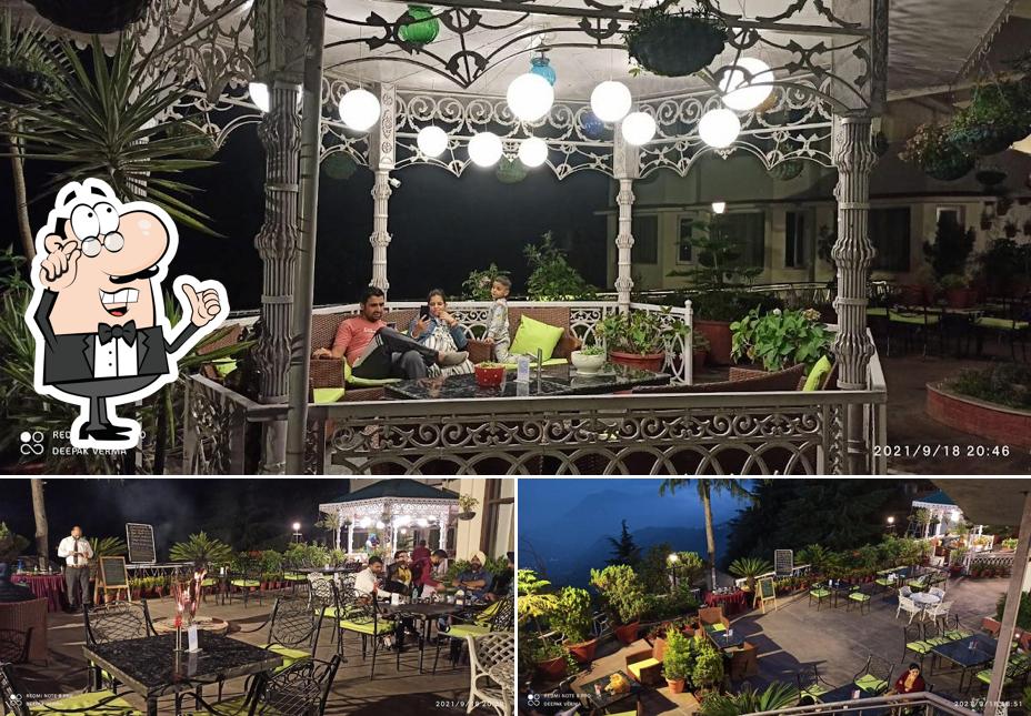 Take a seat at one of the tables at Tipsy Yake A Rooftop Bar & Grill @ Hotel Mount View